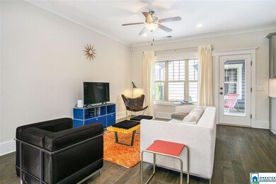 The living room opens to the gorgeous kitchen and 