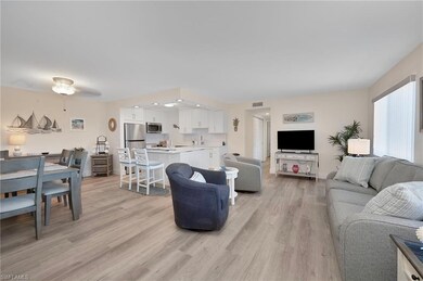 Living area featuring light wood-type flooring, a 