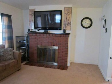 Living Room. Living room features a wood burning f