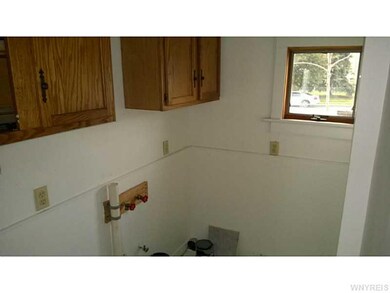 Laundry. 1st floor laundry located between kitchen