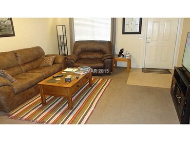 Family Room. Carpeted family room with ceiling fan