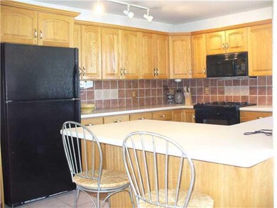 Kitchen. Kitchen with ceramic tiles, corian tiles,