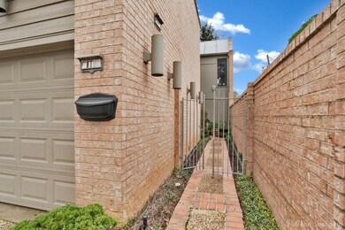 View of side of property featuring a garage