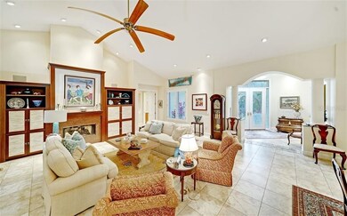 Living Room w/High Ceilings and Fireplace