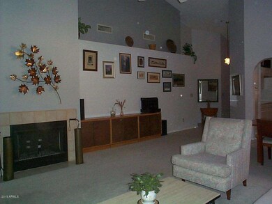 Great Room With Fireplace & Gallery Wall