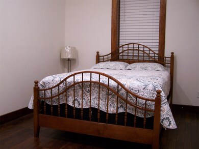 Bedroom #2 on the 1st floor has a queen bed and on