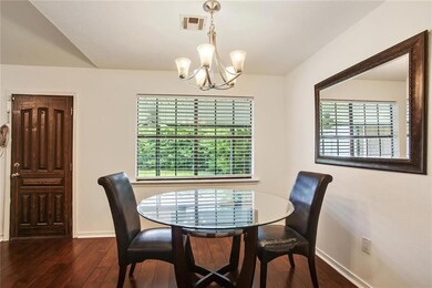 Dining room with natural light and fresh paint.