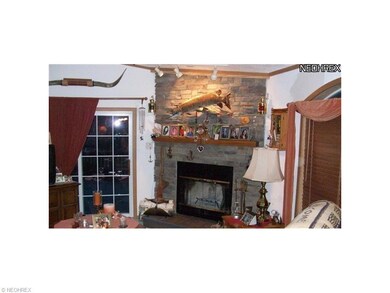 step down into this family room that leads to outd