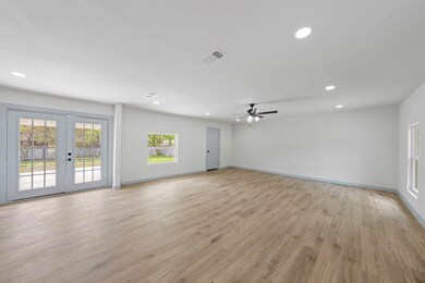 Unfurnished living room featuring recessed lightin