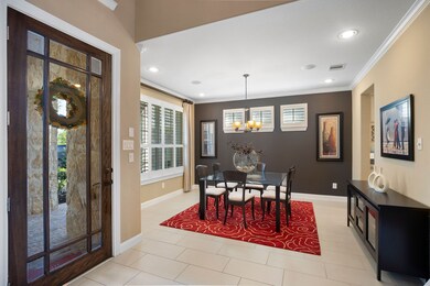 To the left of the gorgeous front door is the formal dining room.