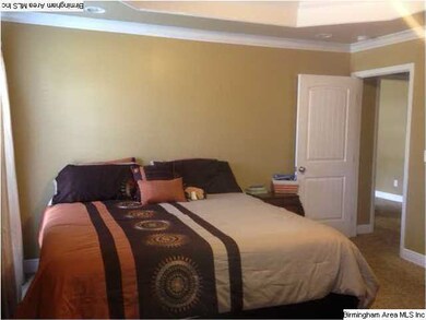 Large master easily accommodates king size furnish