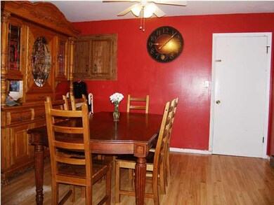 THE DINING AREA...THE DOOR GOES TO THE STAIRWAY TO