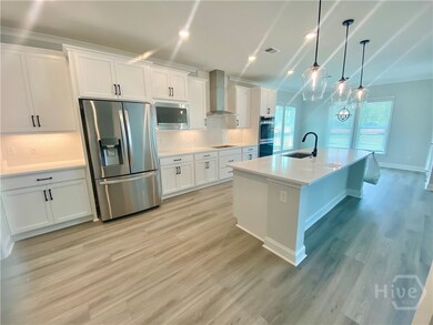 Gourmet appliance package kitchen with quartz coun