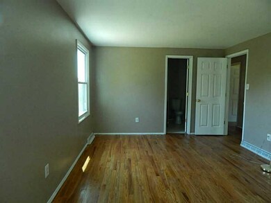Dining Room. Hardwood floors, neutral walls.