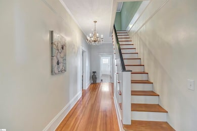 Hallway and stairs between the first and second fl