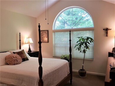 SECOND FLOOR MASTER BEDROOM HAS VAULTED CEILING AS