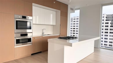 Kitchen with a sink, appliances with stainless st