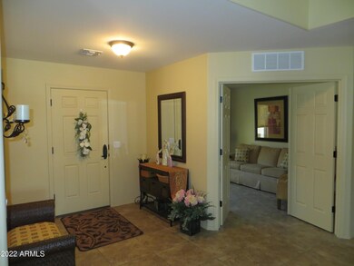 Foyer and den