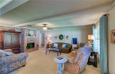 Family room with wood burning fireplace