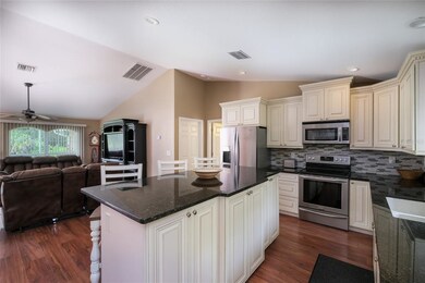 Open Kitchen with Granite & stainless Steel Applia