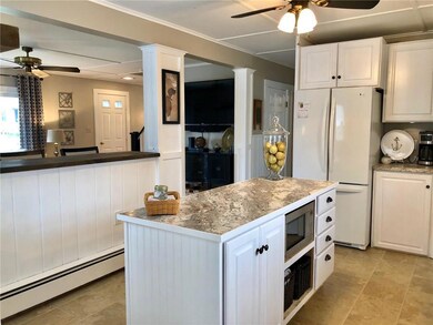 From the spacious mudroom, directly...