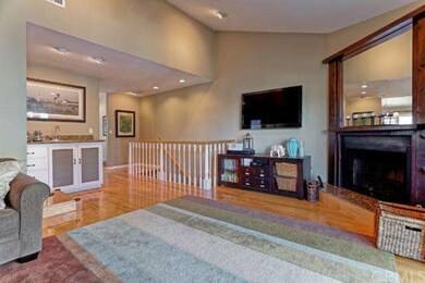 View of the living room with granite wet bar and s