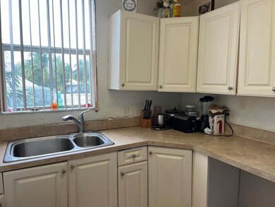 Kitchen with view of back yard