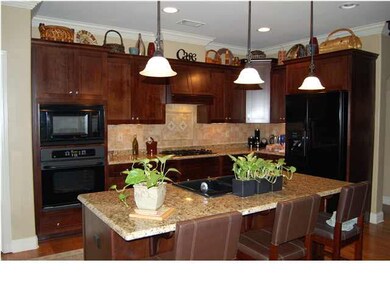 Formal dining room with hardwood floors