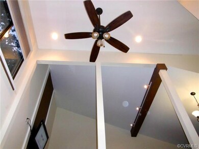 Vaulted ceiling with exposed beam, remote control 