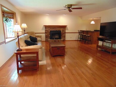 View of fireplace and wet bar