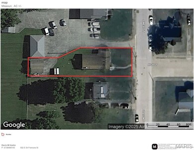 Aerial view of property's location with property parcel outlined