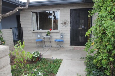 front patio & W iron entry door