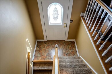 Open front entrance foyer leading to living room / kitchen /bedrooms upstairs and comfort living in lower level.