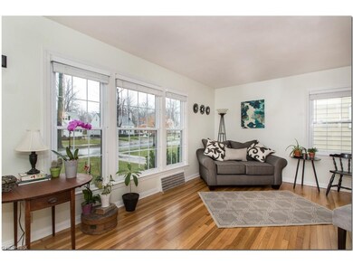 Spacious Living Room with Gleaming Hardwood Floors