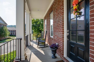 The inviting 22' x 6' covered front is the perfect place to relax.