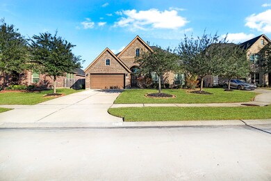 Professional landscaping. Extra long & wide Driveway extends to the 3 Car Garage is ready for your vehicle parking needs.