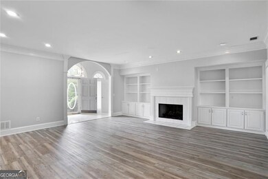 Love the fresh paint and built in cabinets.