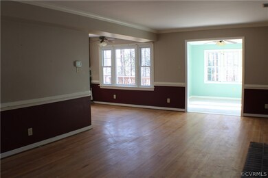 Open, Expansive living room with hardwood floors,c