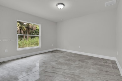1006 Asther St E, Lehigh Acres, FL 33974 - photo 4