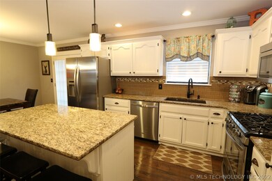 New can lights, floors, new faucet, sink and backs
