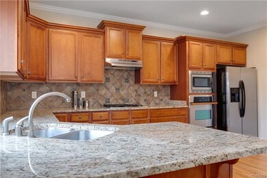 Abundant cabinetry and granite counters!