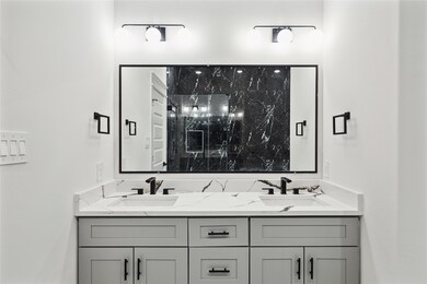 Primary bathroom with dual vanity