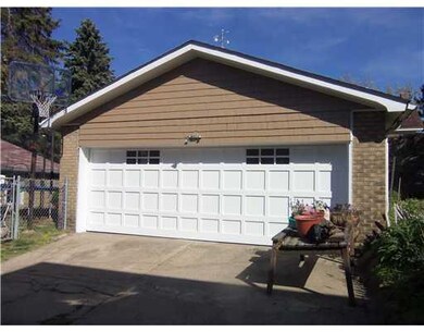 Exterior Back. Large, good condition, 2-car detach