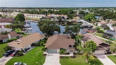 YOU CAN REALLY APPRECIATE THE SIZE OF THIS HOME AND ITS AMAZING LOCATION FROM THIS AERIAL SHOT WITH THE WATERWAY BEHIND IT!