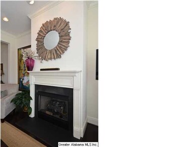 The gas fireplace & elegant mantle is the main foc