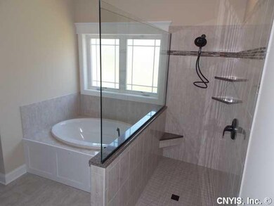 Master Bath/Spa. Soaking tub and mud based tiled s