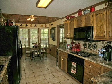 Updated Kitchen with Tile Floors, Tile Back Splash