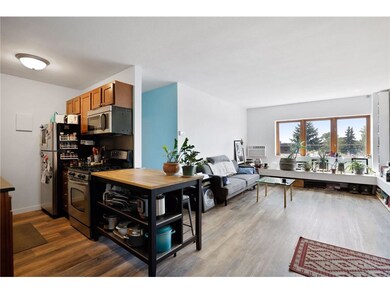Beautiful new flooring throughout the unit adds a 