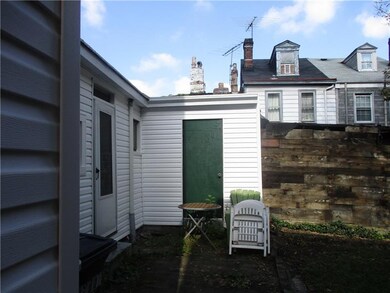 Small but handy courtyard. Nice shed to store outd
