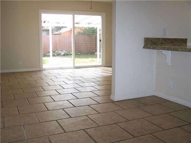Entry way looking into Kitchen and Living Room